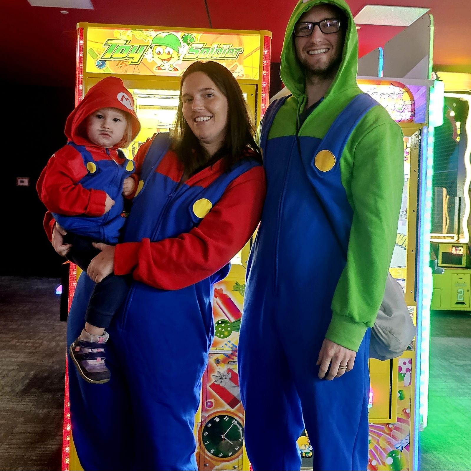 couple dress up as mario and luigi for Mario Day at high caliber